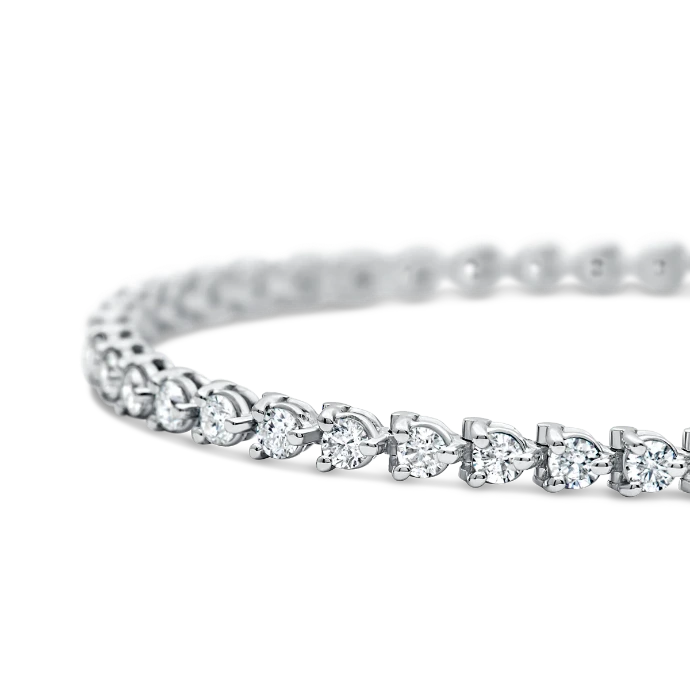 RBT5001-O.11PTS 18KW 3 PRONG TENNIS BRACELET 43-4.44CT LG